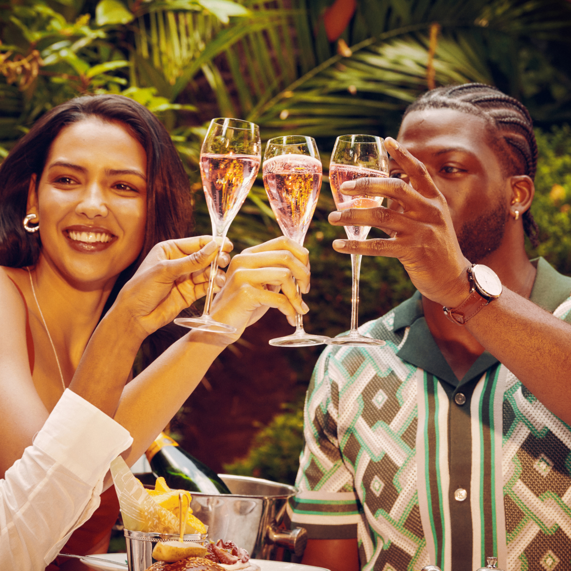 A Glass of The Ivy Rose Cuveé on us